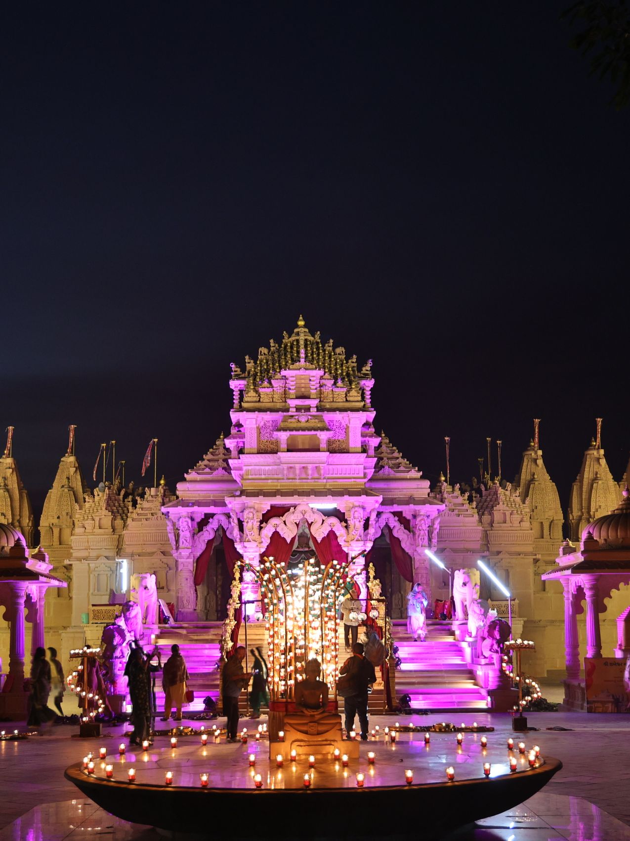 A Jain temple lit for a festival at night