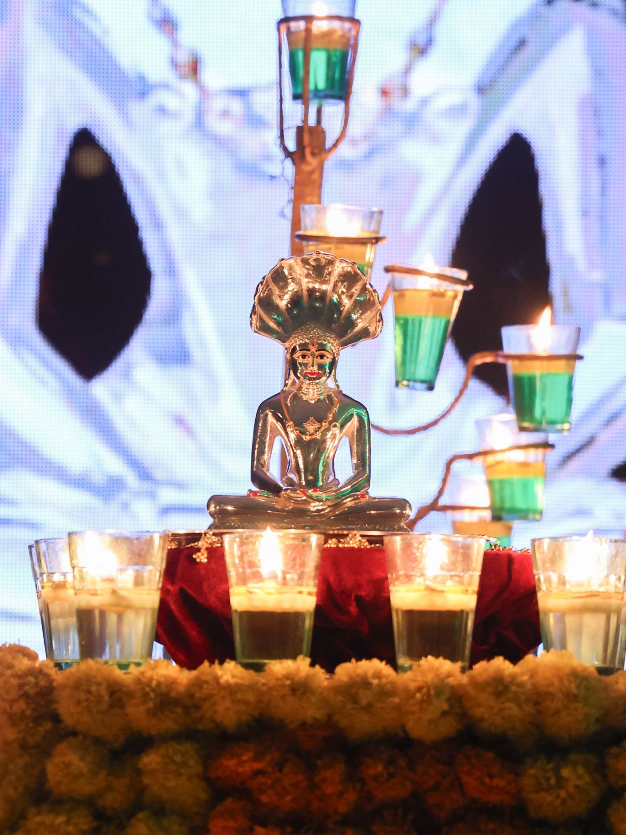 Brass aarti lamp with marigold at a griha pravesh